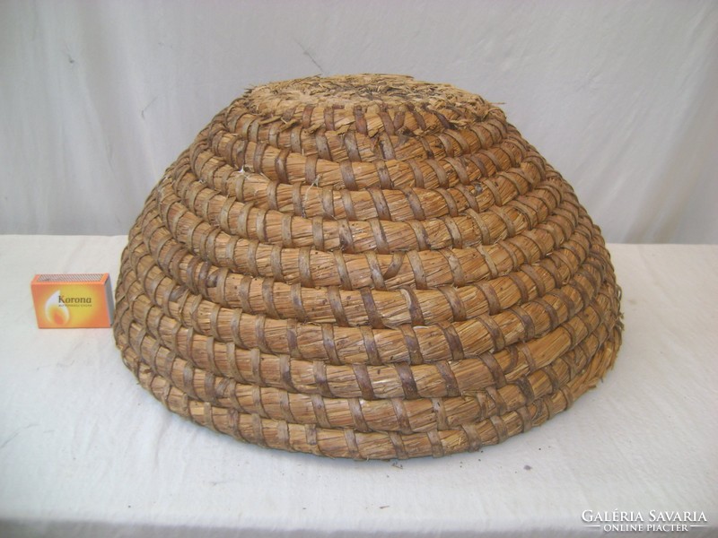 Old wicker basket with straw basket