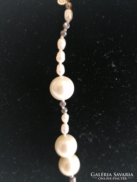 A string of pearls decorated with real pearls