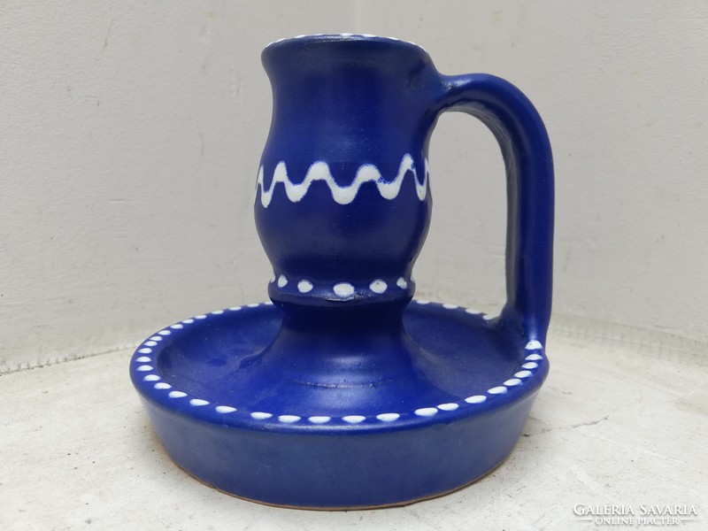 Blue and white patterned ceramic candle holder with ears