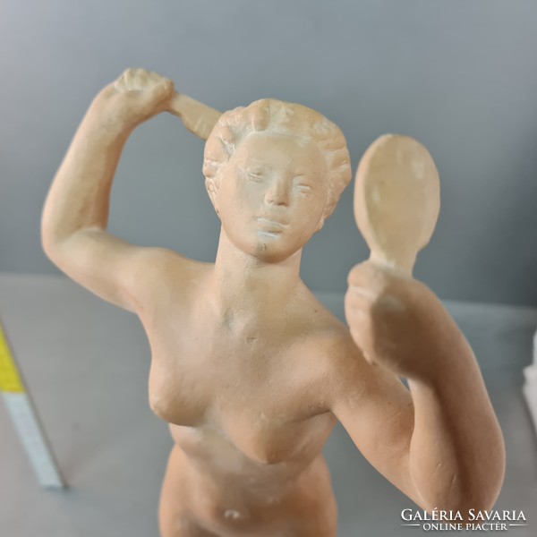 Statue of István Tar (theisz) combing female nude (1330)