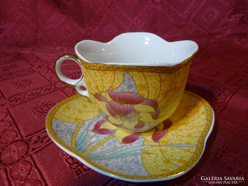 Japanese porcelain tea cup + saucer, rectangular. He has!