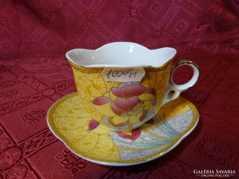 Japanese porcelain tea cup + saucer, rectangular. He has!