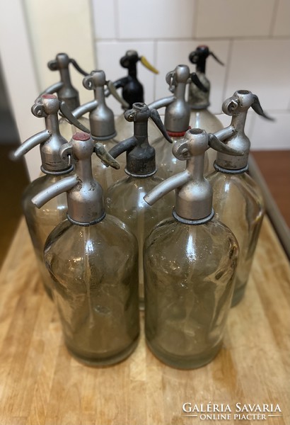 11 old empty soda bottles