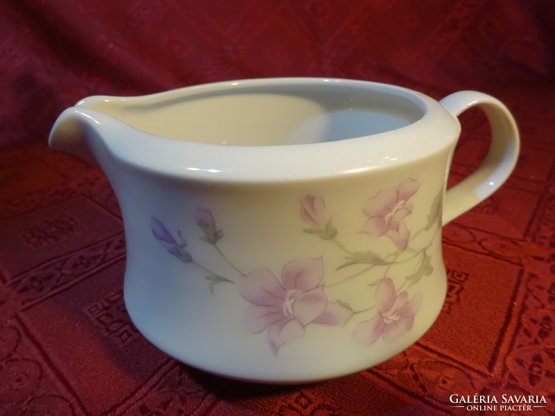 Lowland porcelain milk spout with pale purple flowers. He has!