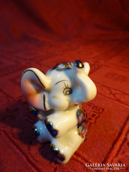 Em & em exclusive German porcelain elephant, height 4.5 cm. He has!