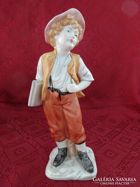 Arpo Romanian porcelain figurine, student with curly hair, height 28 cm. He has!