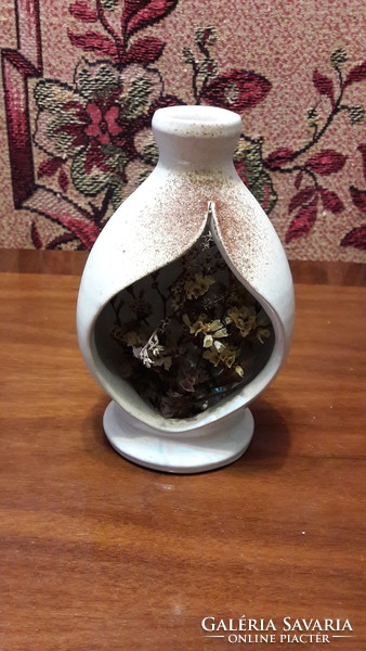 Ceramic ornament with dried flowers