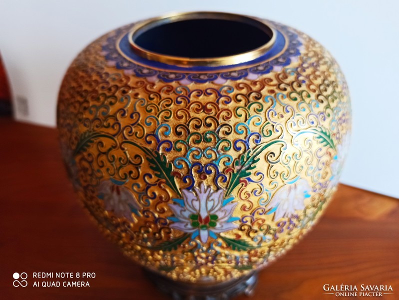 Vase with finely crafted, enamelled compartment lid.