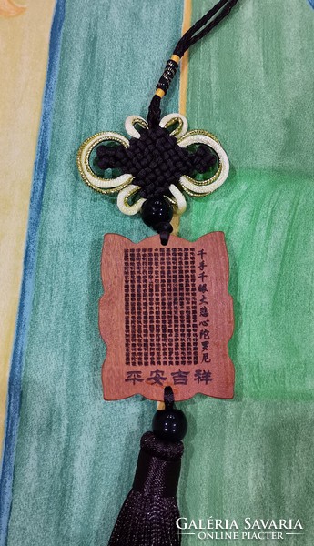 Real term. Rosewood pendant, amulet, buddha in lotus