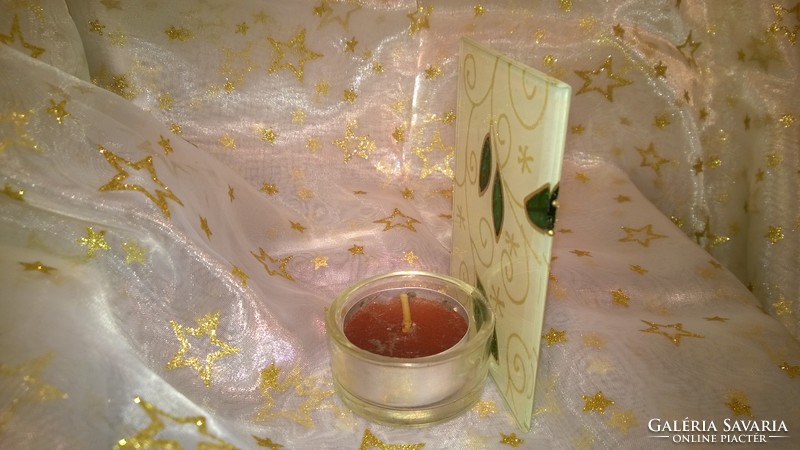 Green-gold candlestick candle as a gift