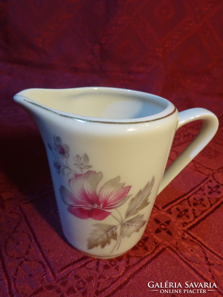 Lowland porcelain milk spout with purple flower, height 8 cm. He has!