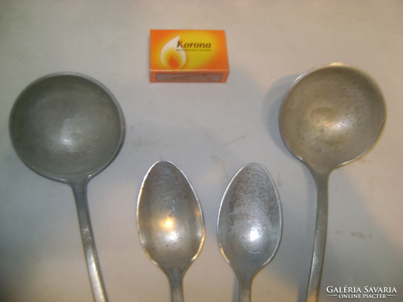 Two retro aluminum ladles and two children's spoons