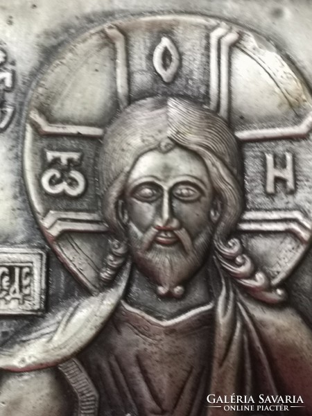 Old metal embossed Russian icon of Jesus