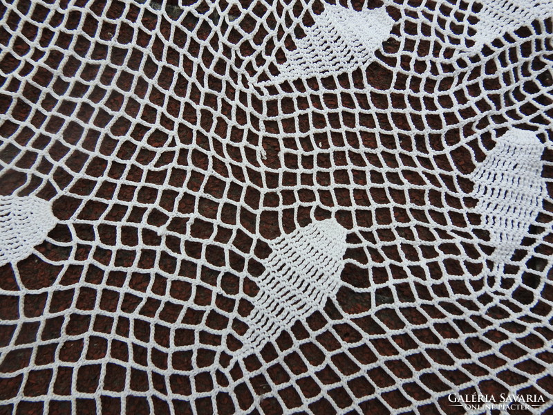 Hand crocheted round tablecloth