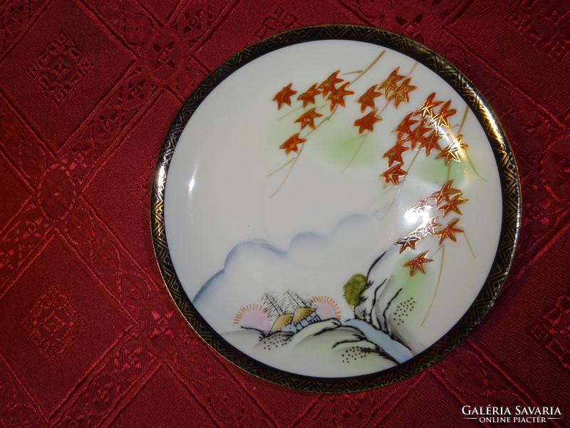 Japanese porcelain teacup coaster, diameter 13.2 cm. He has!