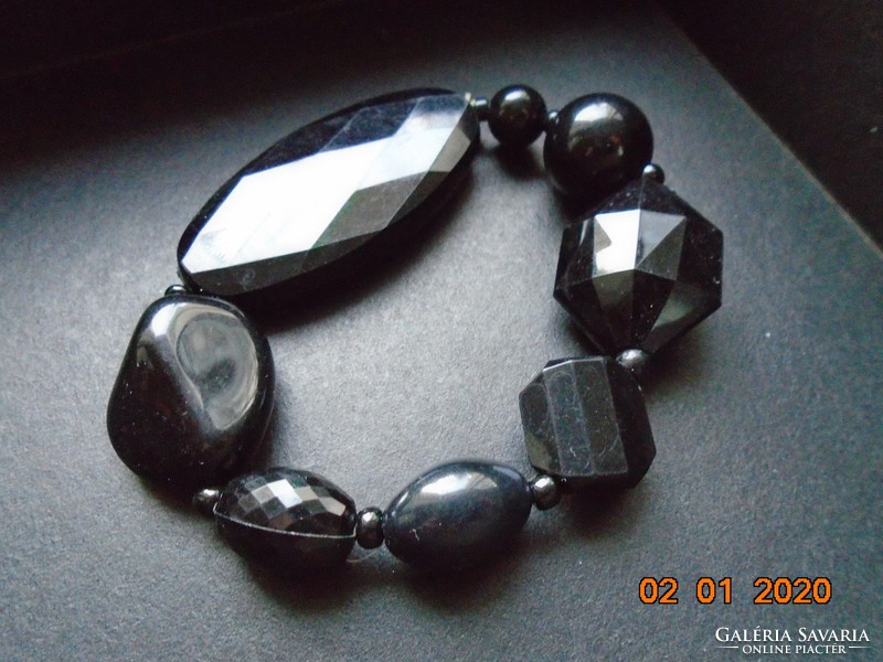 Bracelet made of black beads of different shapes and sizes