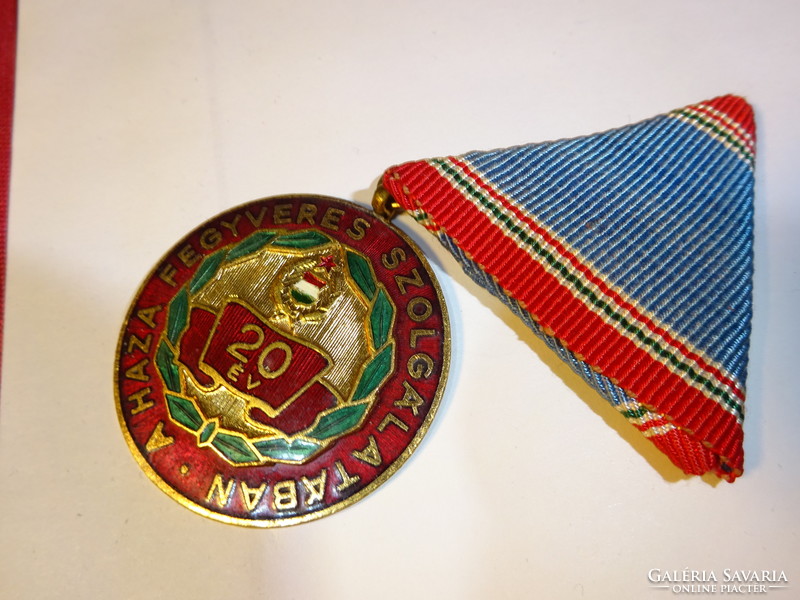 Honor, 20 years in the armed service of the country with the inscription. Its diameter is 4 cm. He has!