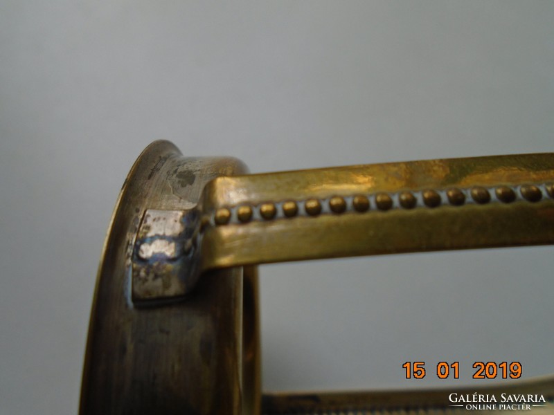 Sometime gilt holder with small lugs
