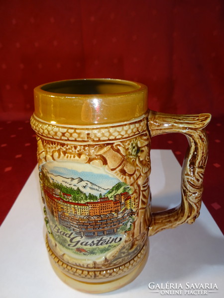 Glazed ceramic jug with a view of bad gastein, height 13.5 cm. He has!