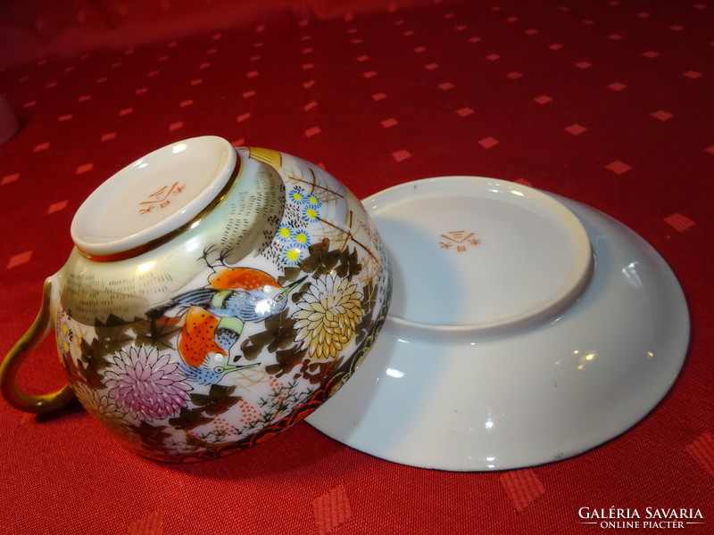 Japanese teacup + placemat, red bird. He has!
