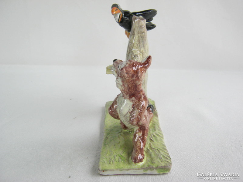 Ceramic figure of a raven and a fox