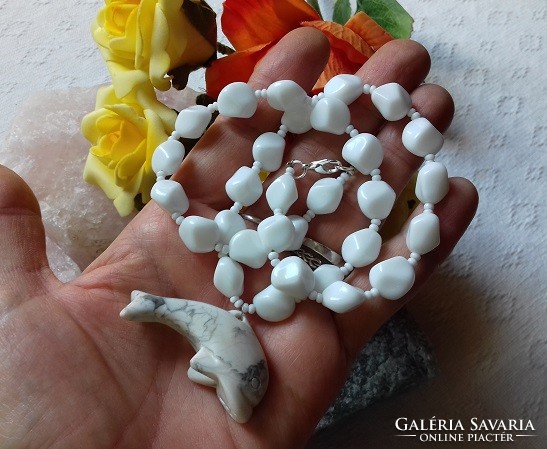 Real term. Unique white ceramic necklace with howlit dolphin pendant