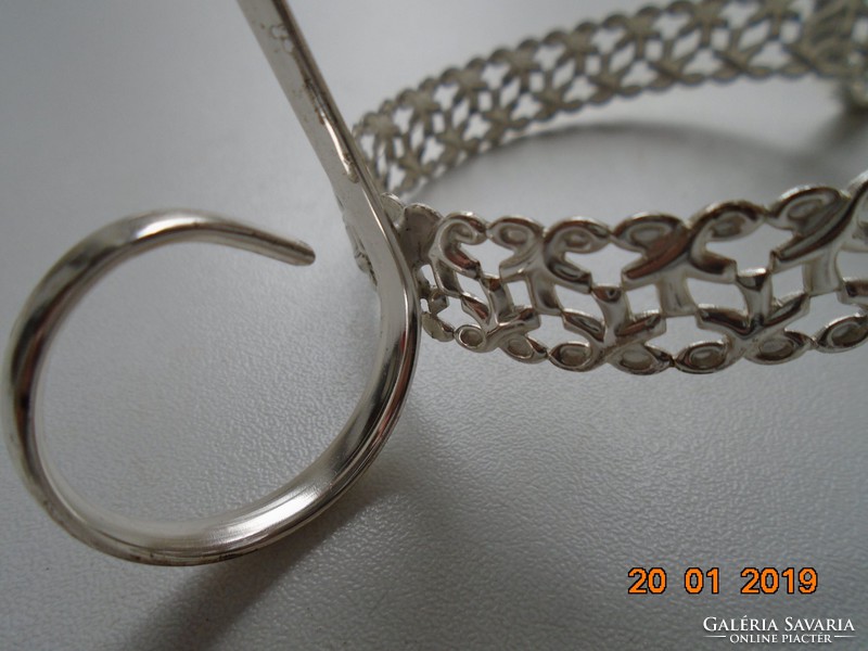 Silver-plated holder with solid grips, filigree openwork ring part