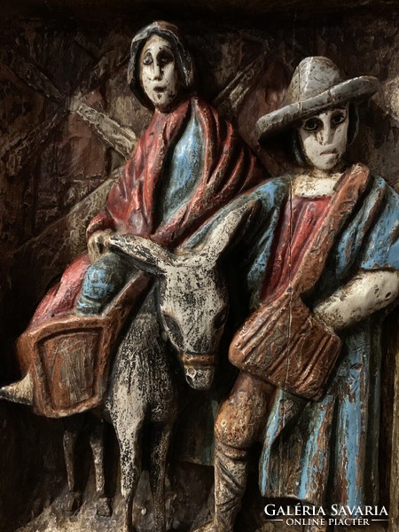 Saint Mary and Joseph scene (carved painted wood)