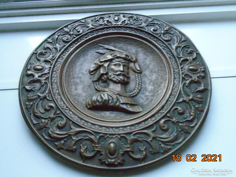 Antique renaissance man with portrait, historic edging patterns, wall plate