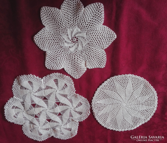 3 beige crochet tablecloths