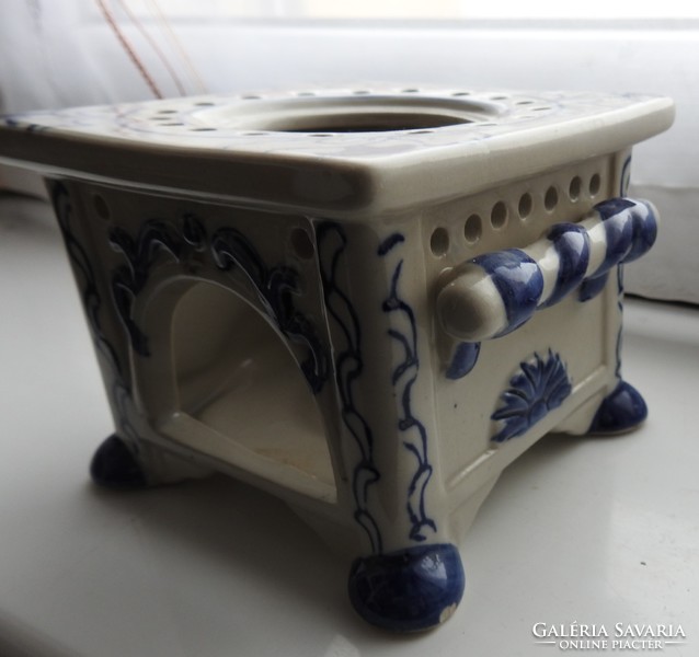 Old porcelain hob with candle holder with cobalt blue painting