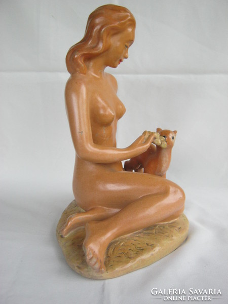 Signed with large ceramic female nude deer