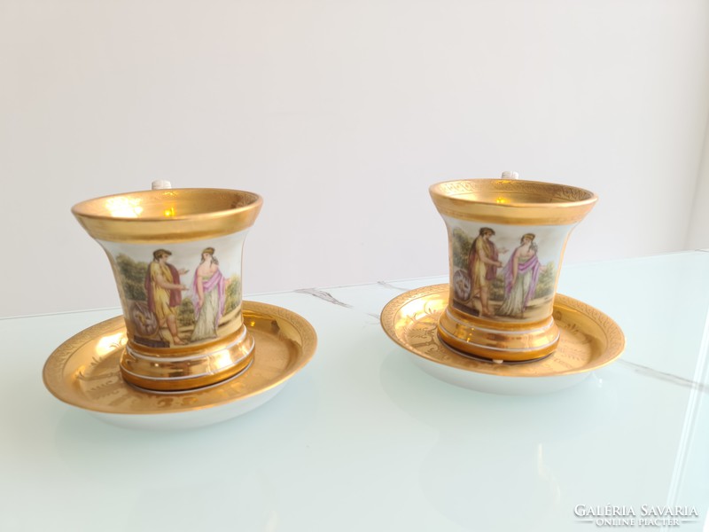 A sumptuous pair of 18th-19th century gilded tea and coffee cups