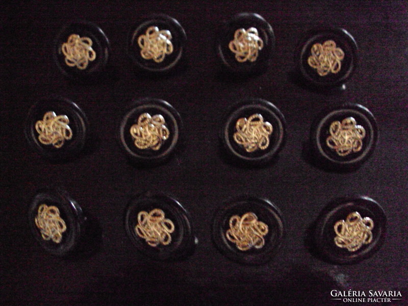 Buttons in silver color on a black background 12 pcs