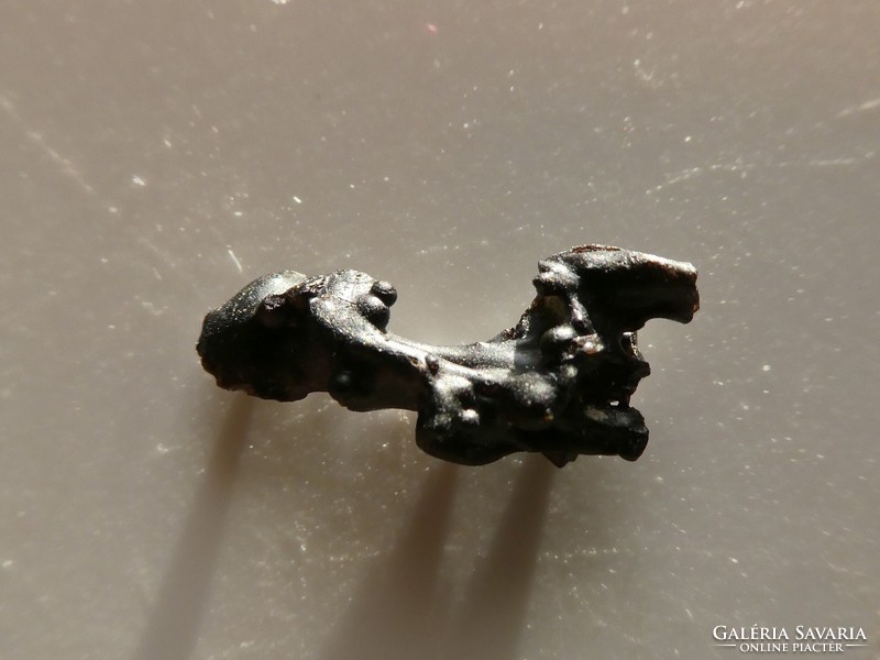 Irritite variant tectite droplet from the zamansin meteorite crater. Rare, collectible pieces.