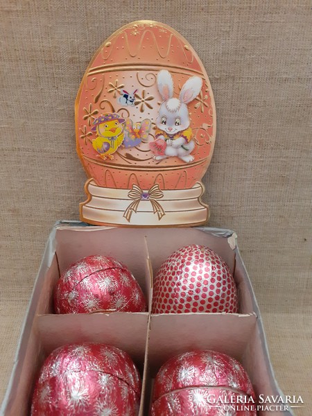 Retro handmade Easter eggs added to decorative water deduction