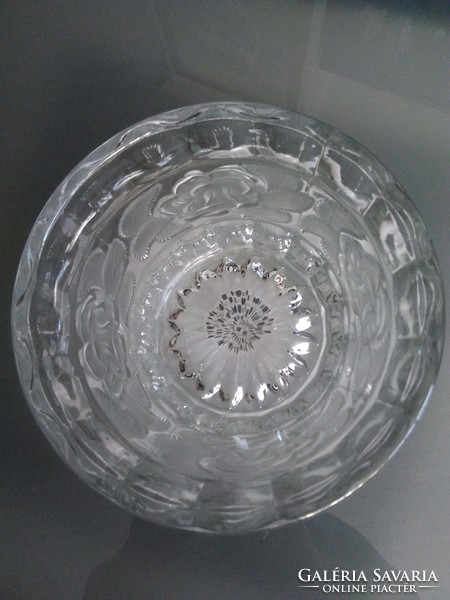 Glass ice bucket with rose decoration on the side.