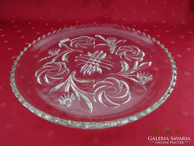 Glass cake plate with four legs and a diameter of 28.5 cm. He has!