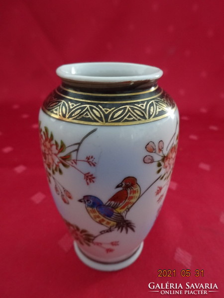 Japanese porcelain vase with bird motif, height 9 cm. He has!