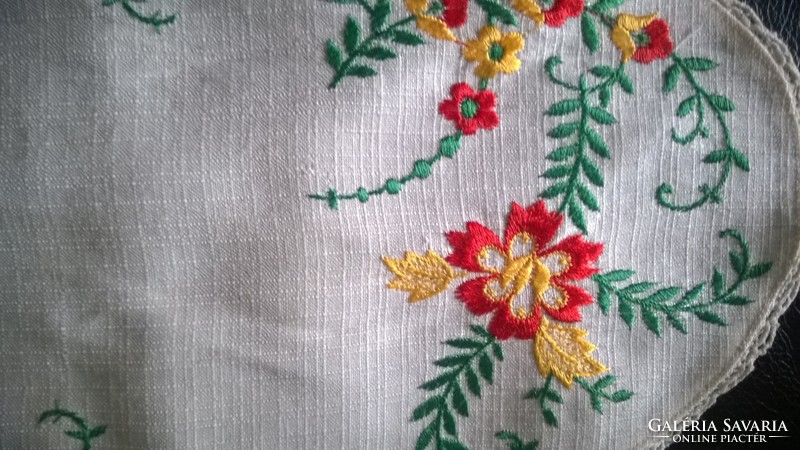 Embroidered small tablecloth flawless beautiful piece.