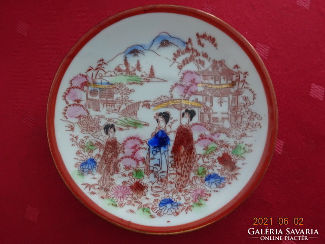 Japanese porcelain teacup coaster, diameter 13.5 cm. He has!