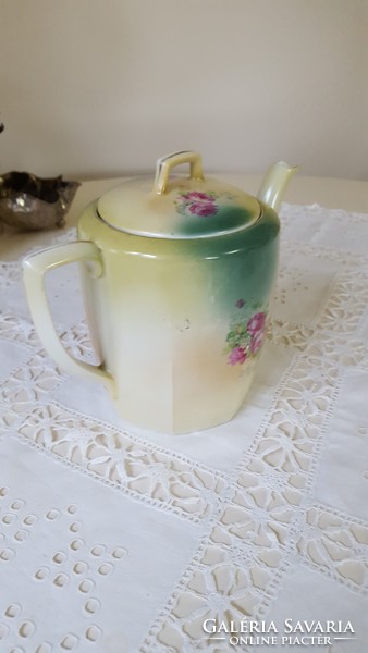 Antique porcelain jug with roses, for decoration