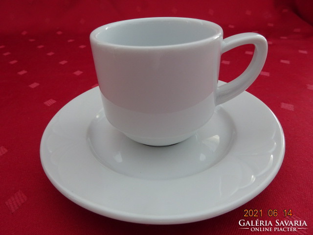 Lowland porcelain, white coffee cup + placemat. He has!