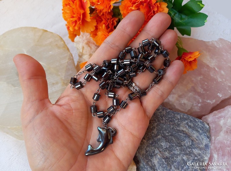 Very showy hematite necklace with hematite dolphin pendant