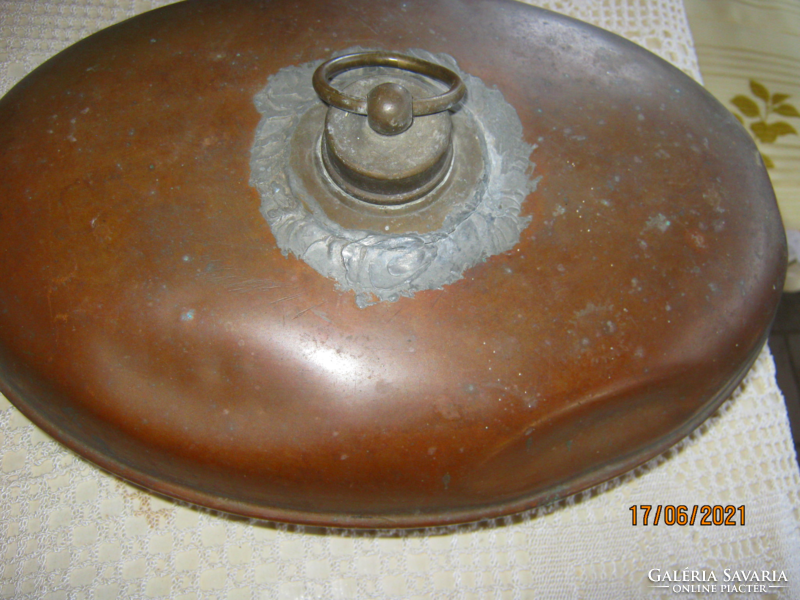 Old copper bed warmer