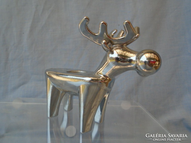 Heavy metal candlestick depicting a unique and special deer