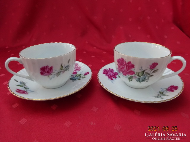 Chinese porcelain, rose patterned teacup + placemat. He has!