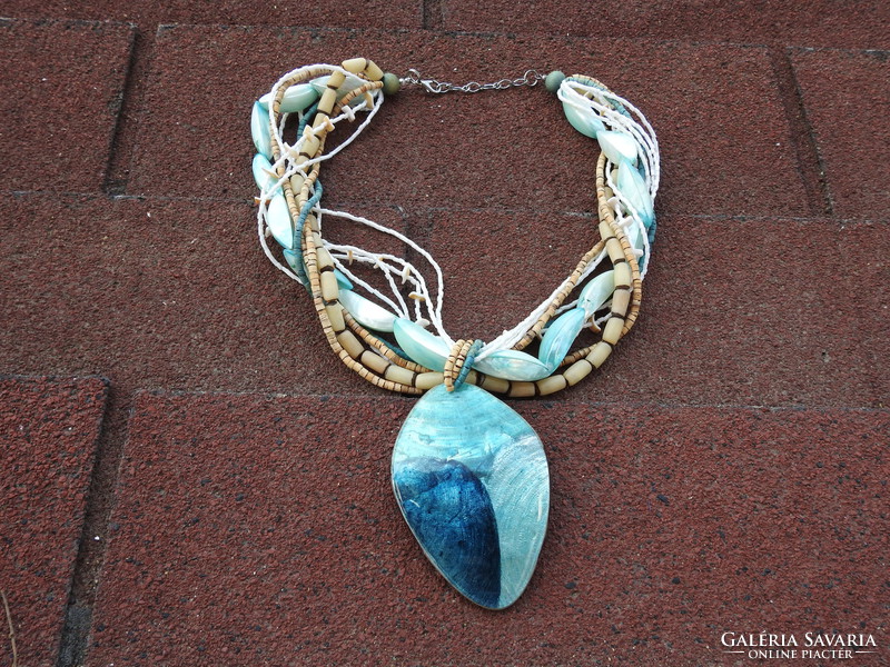 Turquoise pearl necklace with a drop-shaped pendant