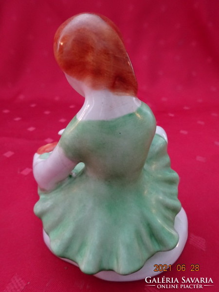 Bodrogkeresztúr porcelain figure, girl in green dress with flower. Its height is 11 cm. There are good ones!