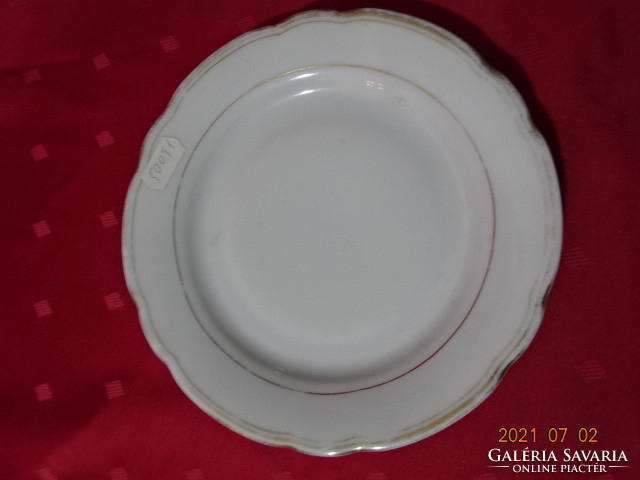 German porcelain cake plate with gold rim, diameter 19 cm. He has!